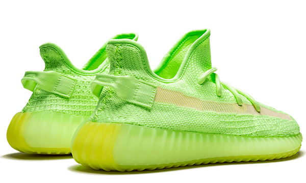 Yeezy triple white glow in the dark hot sale